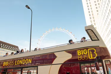People on Big Bus tour bus touring London