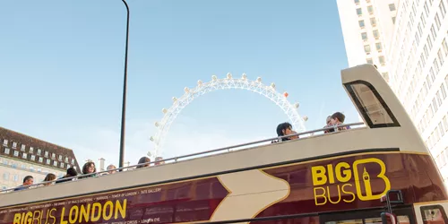 People on Big Bus tour bus touring London